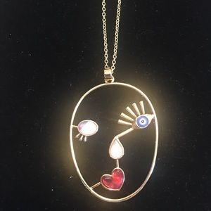 Ladies face necklace